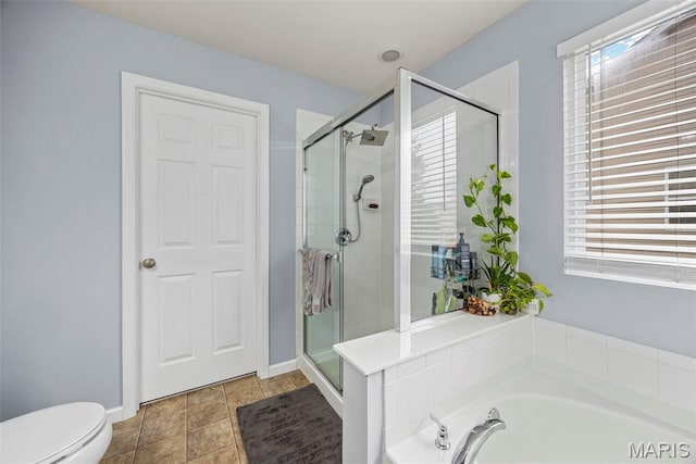 77 Brighton Park Dr, Saint Charles, MO 63303 - full bath featuring a shower stall, a garden tub, and toilet