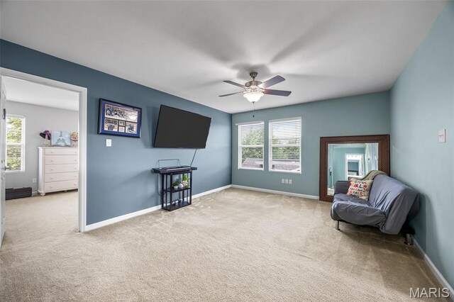 77 Brighton Park Dr, Saint Charles, MO 63303 - sitting room with carpet, ceiling fan, and baseboards