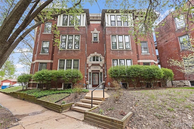 5858 Nina Pl Unit 3E, Saint Louis, MO 63112 - view of front of house featuring brick siding