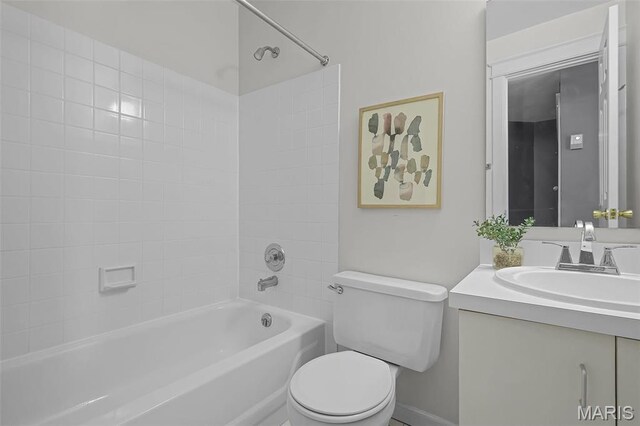 5858 Nina Pl Unit 3E, Saint Louis, MO 63112 - bathroom featuring bathing tub / shower combination, toilet, vanity, and baseboards