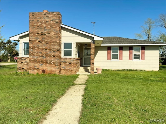 708 Locust St, Edgar Springs, MO 65462 - view of front facade featuring a front lawn and a chimney