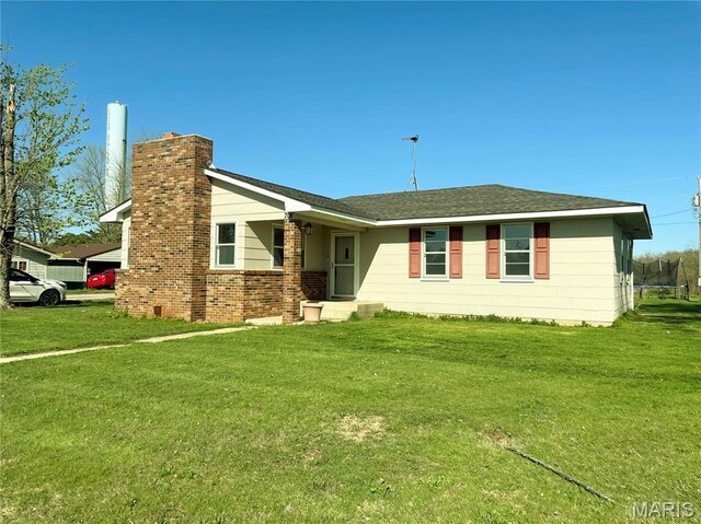 708 Locust St, Edgar Springs, MO 65462 - ranch-style house with a front lawn and a chimney
