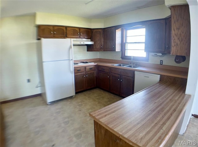 708 Locust St, Edgar Springs, MO 65462 - kitchen featuring white appliances, a sink, light flooring, exhaust hood, and light countertops