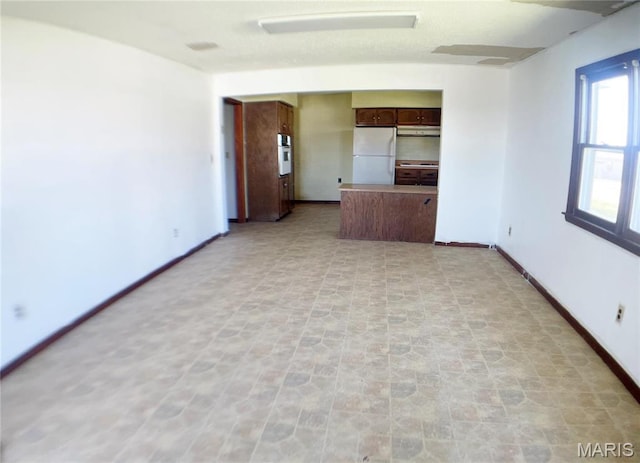 708 Locust St, Edgar Springs, MO 65462 - empty room with baseboards