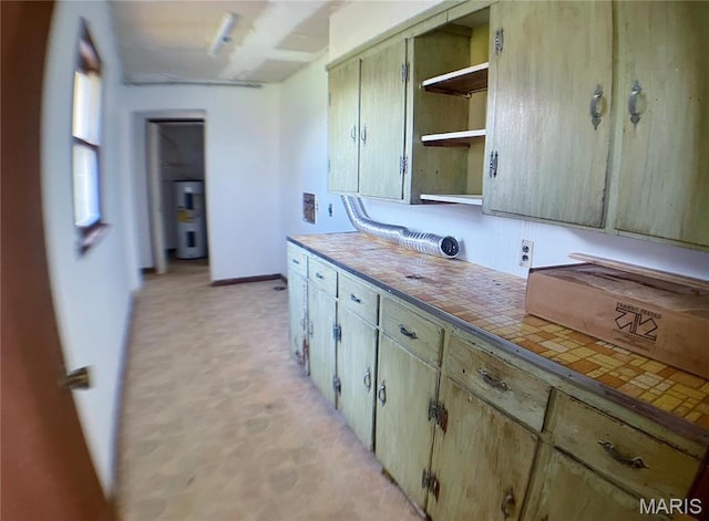 708 Locust St, Edgar Springs, MO 65462 - kitchen featuring open shelves, water heater, and tile counters