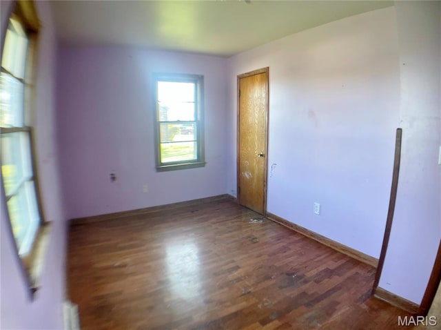 708 Locust St, Edgar Springs, MO 65462 - spare room featuring wood finished floors and baseboards