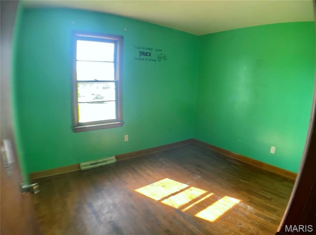 708 Locust St, Edgar Springs, MO 65462 - spare room featuring wood finished floors and baseboards