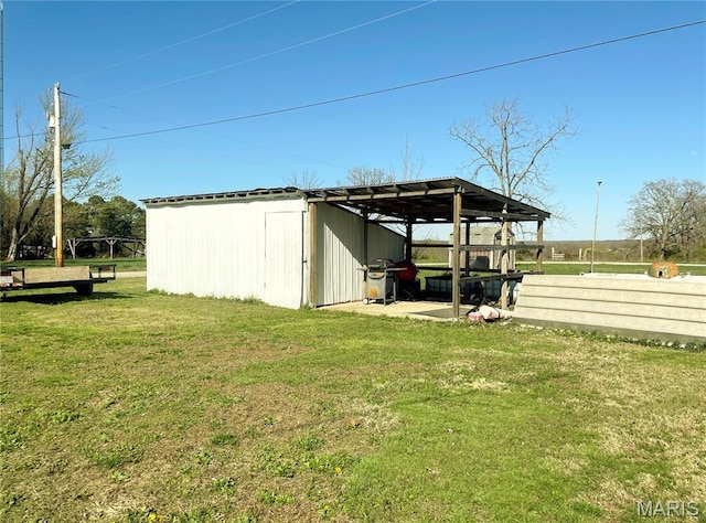 708 Locust St, Edgar Springs, MO 65462 - view of pole building featuring a lawn