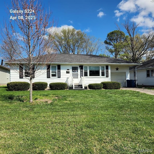 2011 Cypress St, Highland, IL 62249 - ranch-style home with concrete driveway, a front yard, and an attached garage