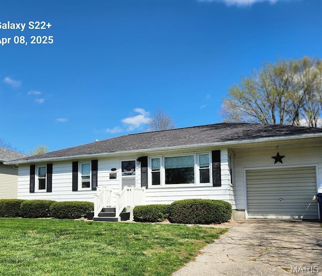 2011 Cypress St, Highland, IL 62249 - ranch-style home with a garage, a front lawn, and driveway