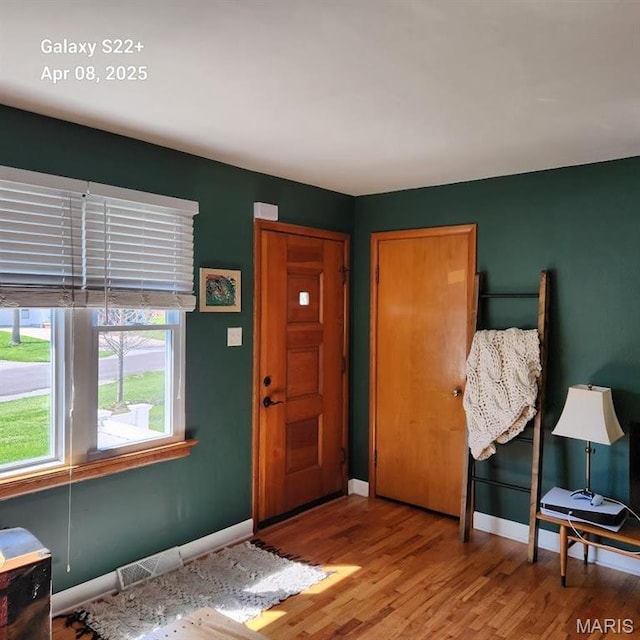 2011 Cypress St, Highland, IL 62249 - entryway featuring wood finished floors and baseboards