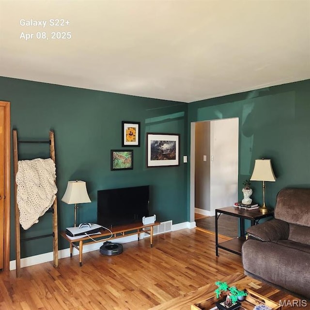 2011 Cypress St, Highland, IL 62249 - living room with baseboards and wood finished floors