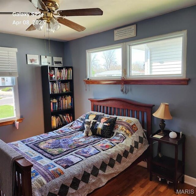 2011 Cypress St, Highland, IL 62249 - bedroom with wood finished floors and a ceiling fan