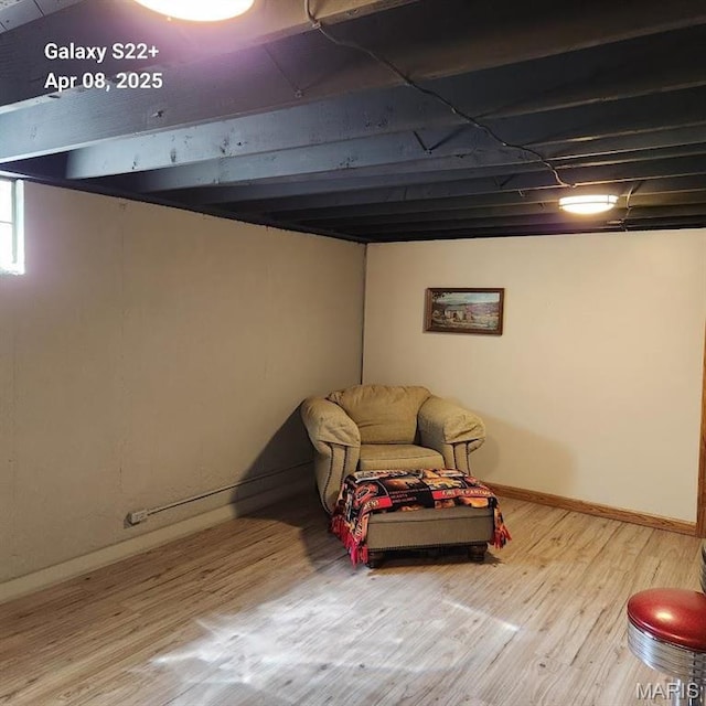 2011 Cypress St, Highland, IL 62249 - below grade area featuring wood finished floors and baseboards