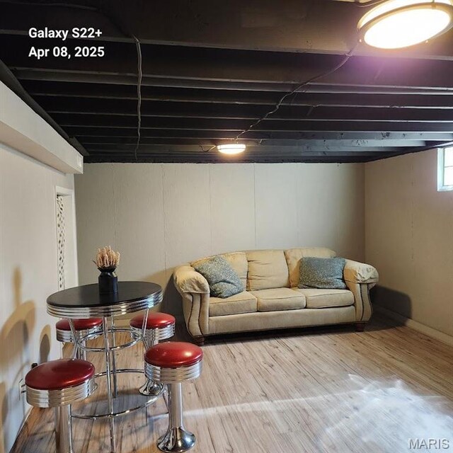2011 Cypress St, Highland, IL 62249 - basement featuring wood finished floors and baseboards