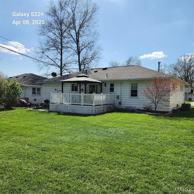 2011 Cypress St, Highland, IL 62249 - rear view of house with a gazebo, a lawn, central AC unit, and a deck