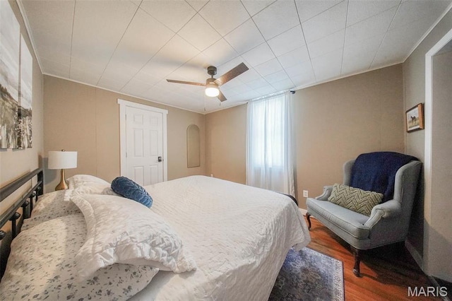15227 County Road 1110, St James, MO 65559 - bedroom featuring wood finished floors, ceiling fan, and ornamental molding