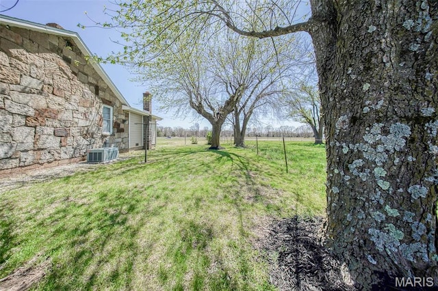 15227 County Road 1110, St James, MO 65559 - view of grassy yard with central AC