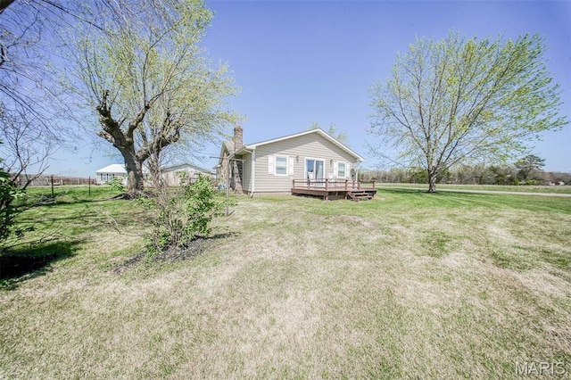 15227 County Road 1110, St James, MO 65559 - view of green lawn featuring a deck