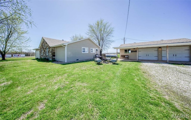 15227 County Road 1110, St James, MO 65559 - view of side of home featuring a yard and a detached garage
