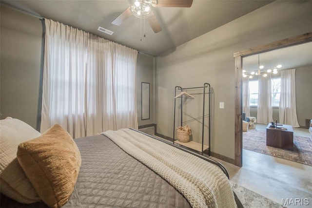 15227 County Road 1110, St James, MO 65559 - bedroom with finished concrete floors, baseboards, and ceiling fan