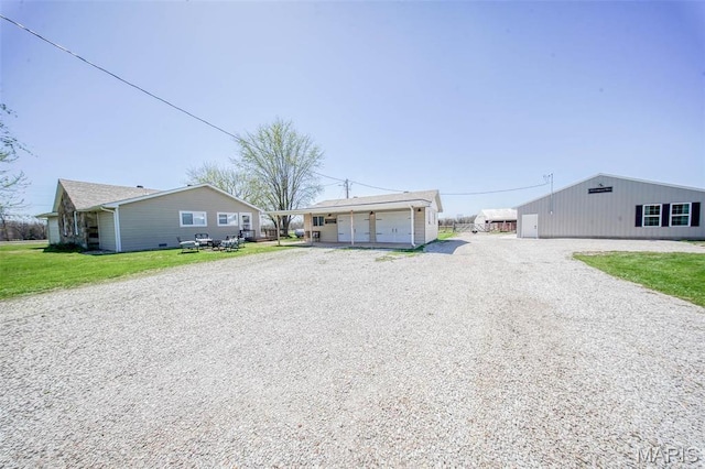 15227 County Road 1110, St James, MO 65559 - view of front of house with an outbuilding and driveway