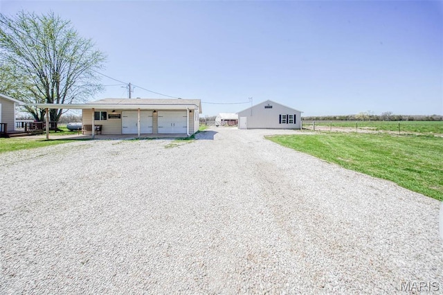 15227 County Road 1110, St James, MO 65559 - view of front facade featuring a garage and driveway