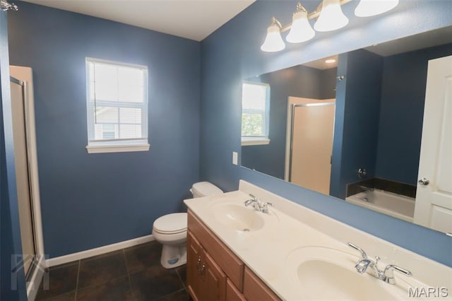 23332 Righteous Ln, Waynesville, MO 65583 - bathroom featuring a stall shower, tile patterned floors, double vanity, and a bath