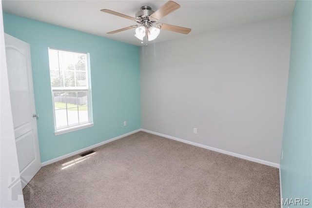 23332 Righteous Ln, Waynesville, MO 65583 - spare room featuring carpet and ceiling fan