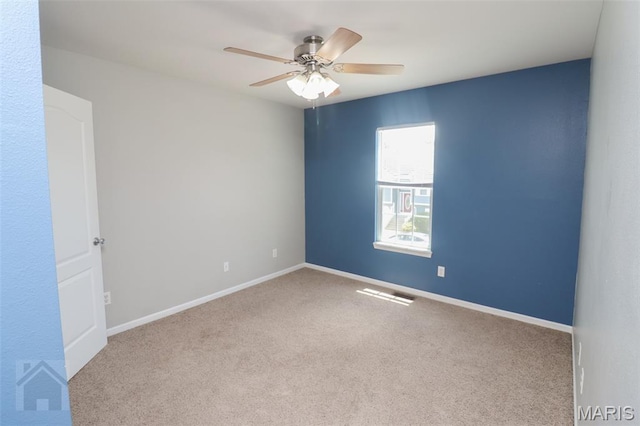 23332 Righteous Ln, Waynesville, MO 65583 - carpeted spare room with ceiling fan and baseboards