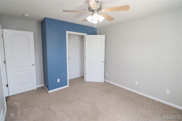 23332 Righteous Ln, Waynesville, MO 65583 - unfurnished bedroom with carpet, a closet, and a ceiling fan