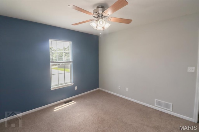 23332 Righteous Ln, Waynesville, MO 65583 - spare room featuring carpet flooring and ceiling fan