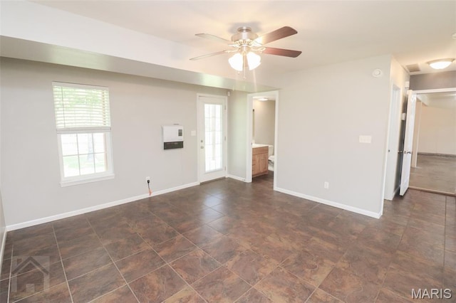 23332 Righteous Ln, Waynesville, MO 65583 - empty room featuring ceiling fan and baseboards