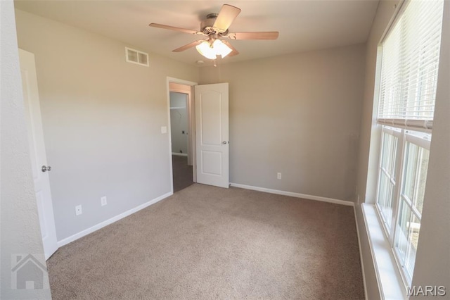 23332 Righteous Ln, Waynesville, MO 65583 - unfurnished bedroom with carpet and a ceiling fan