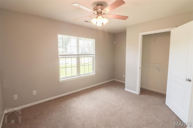 23332 Righteous Ln, Waynesville, MO 65583 - unfurnished bedroom featuring carpet floors, a closet, and ceiling fan