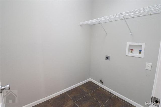 23332 Righteous Ln, Waynesville, MO 65583 - laundry area with washer hookup, hookup for an electric dryer, and dark tile patterned flooring