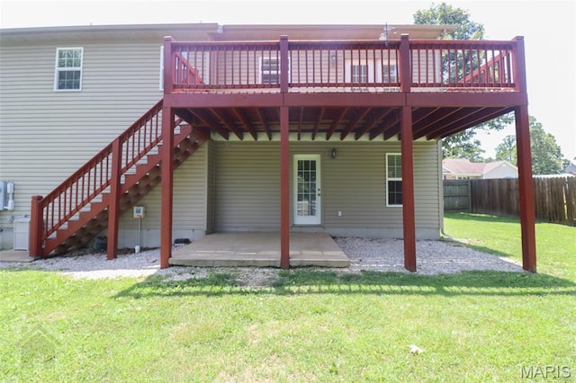23332 Righteous Ln, Waynesville, MO 65583 - rear view of property featuring a wooden deck, a fenced backyard, a patio, and stairs