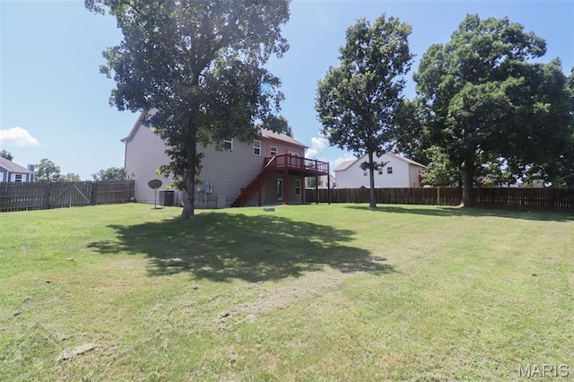 23332 Righteous Ln, Waynesville, MO 65583 - fenced backyard featuring stairs and a deck