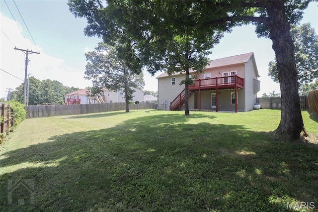 23332 Righteous Ln, Waynesville, MO 65583 - fenced backyard featuring stairs and a deck