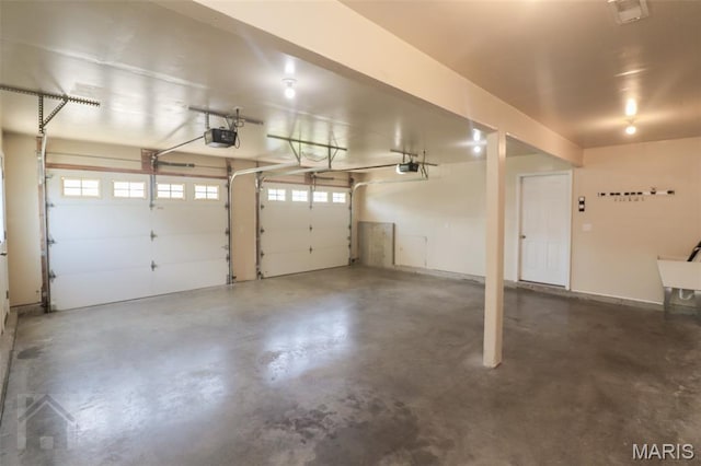 23332 Righteous Ln, Waynesville, MO 65583 - garage featuring a garage door opener