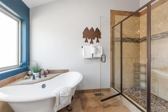 1318 Stormy Point Rd Unit 7, Branson, MO 65616 - full bathroom featuring a shower stall, a freestanding bath, baseboards, and stone finish flooring
