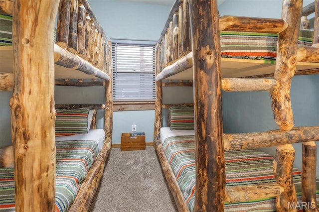 1318 Stormy Point Rd Unit 7, Branson, MO 65616 - unfurnished bedroom featuring carpet flooring and baseboards