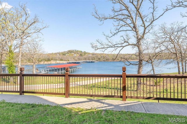 1318 Stormy Point Rd Unit 7, Branson, MO 65616 - exterior space featuring a water view and fence