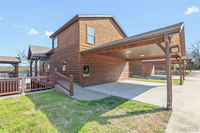 1318 Stormy Point Rd Unit 7, Branson, MO 65616 - view of home's exterior featuring a shingled roof