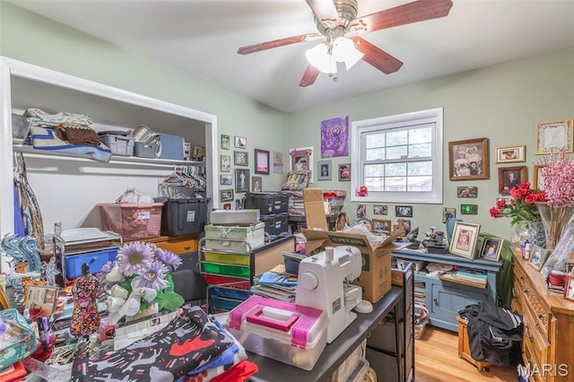 office space with ceiling fan and wood finished floors