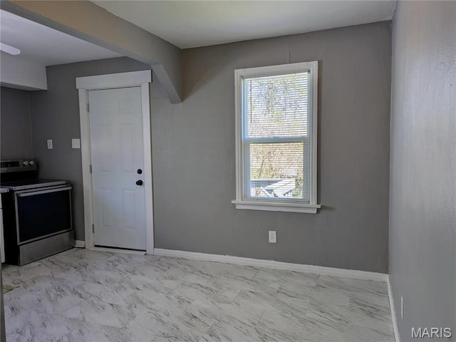 330 N Floridale Ave, Saint Louis, MO 63135 - interior space with healthy amount of natural light, light marble finish floors, and baseboards