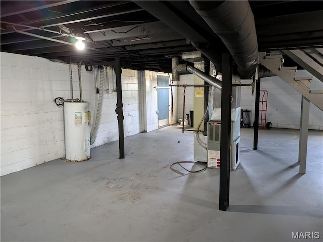 330 N Floridale Ave, Saint Louis, MO 63135 - unfinished basement with water heater and stairway