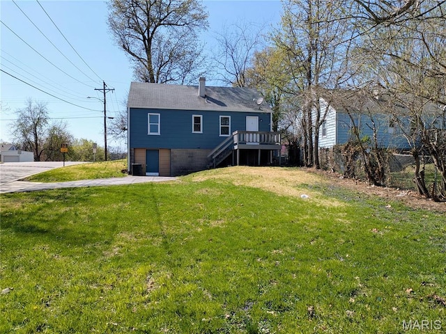 330 N Floridale Ave, Saint Louis, MO 63135 - rear view of property featuring stairs, a chimney, driveway, and a deck