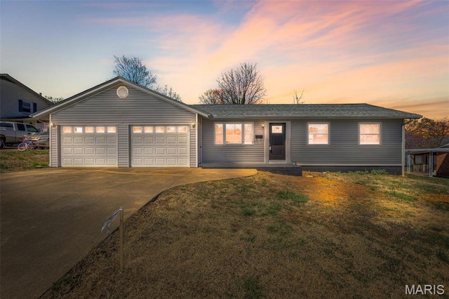 615 N School St, Desloge, MO 63601 - ranch-style home with driveway, an attached garage, and a lawn