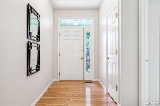 104 Eagle Cove Pl Unit 39B, Saint Charles, MO 63303 - foyer featuring light wood-style flooring and baseboards